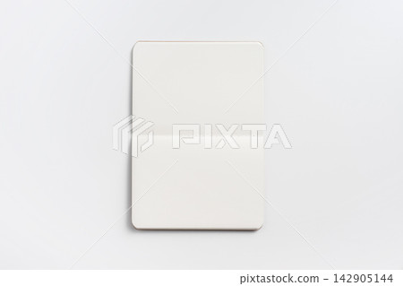 Top view of open blank notebook mockup and pen on white background 142905144