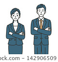 Business professionals, both male and female, standing with their arms crossed, exuding confidence. 142906509
