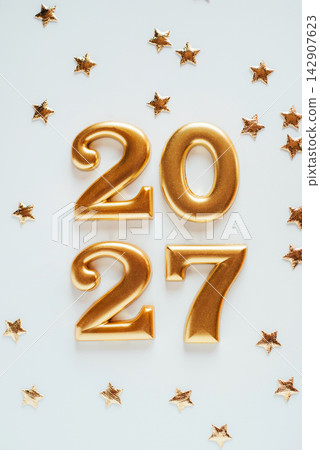 Metal numbers 2027 on a white table. Happy New Year 2026 is coming concept. Metal numbers 2027 on a white table. Happy New Year 2026 is coming concept. 142907623