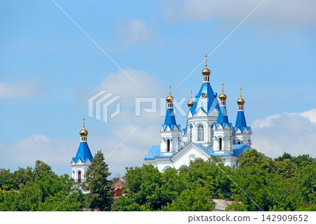 St George Orthodox Church with blue roofs and golden domes in Kamianets-Podilskyi. 142909652