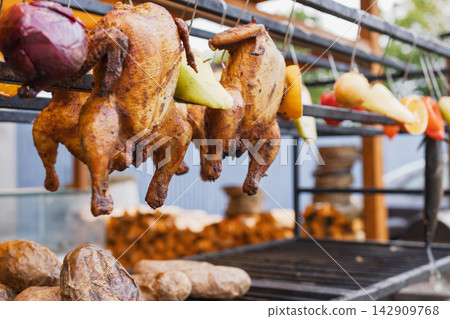 Roasted Chickens and Vegetables in Medieval Style Roasted Chickens and Vegetables in Medieval Style 142909768