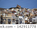 Colourful Hillside Houses and Anastasis Church in Ermoupoli, Syros, Greece 142911778