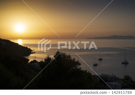 Golden Sunset over the Aegean Sea with Sailing Boats, Syros, Greece 142911789