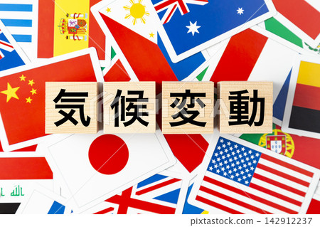 Blocks with the words "Climate Change" written on them and various national flags. Blocks with the words "Climate Change" written on them and various national flags. 142912237