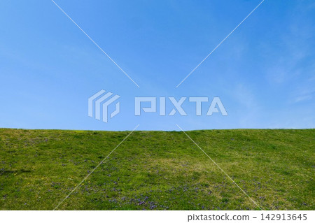 Landscape of Clear Blue Sky Meeting Green Grassy Hill Landscape of Clear Blue Sky Meeting Green Grassy Hill 142913645