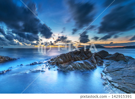 sunset over the sea sunset over the sea 142915391