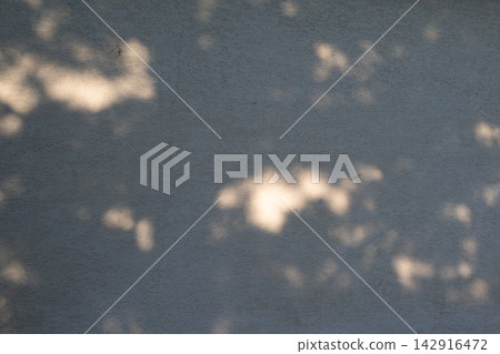Abstract Light and Shadows on Concrete Wall, Minimalist Atmospheric Background. Abstract Light and Shadows on Concrete Wall, Minimalist Atmospheric Background. 142916472