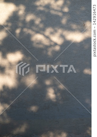 Abstract Light and Shadows on Concrete Wall, Minimalist Atmospheric Background. Abstract Light and Shadows on Concrete Wall, Minimalist Atmospheric Background. 142916473