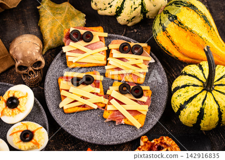 Halloween appetizers. Assortment of snack, food, party buffet Halloween appetizers. Assortment of snack, food, party buffet 142916835