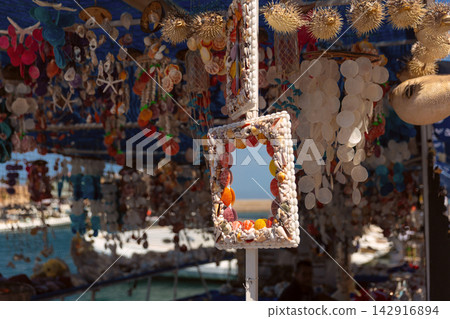 Handmade Seashell Souvenirs at Chania Harbor Market in Crete, Greece Handmade Seashell Souvenirs at Chania Harbor Market in Crete, Greece 142916894