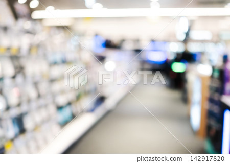 Blurred Retail Store Aisle Bokeh Lights Background Blurred Retail Store Aisle Bokeh Lights Background 142917820