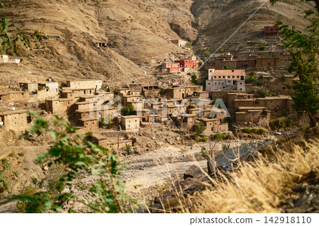 Rural Desert Village Surrounded by Dry Mountains Rural Desert Village Surrounded by Dry Mountains 142918110