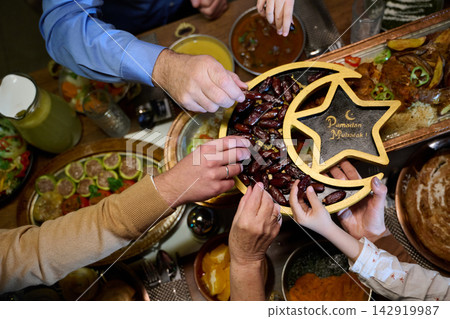 Family Sharing Dates at Ramadan Iftar Dinner Ramadan Mubarak Celebration With Loved Ones Family Sharing Dates at Ramadan Iftar Dinner Ramadan Mubarak Celebration With Loved Ones 142919987