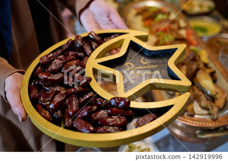 Ramadan Dates Platter With Crescent Star Tray and Ramadan Mubarak Greeting For Iftar Celebration Ramadan Dates Platter With Crescent Star Tray and Ramadan Mubarak Greeting For Iftar Celebration 142919996