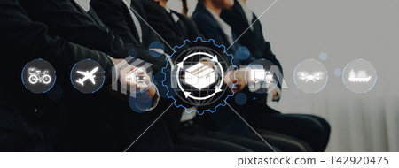 Business professionals engaged in logistics and supply chain management with modern icons representing various transportation methods. Nascent Business professionals engaged in logistics and supply chain management with modern icons representing various transportation methods. Nascent 142920475