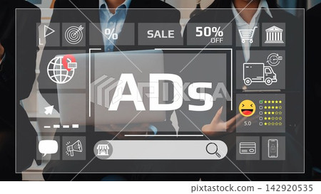 Business Team Analyzing Digital Advertising Strategies with Laptop and Promotional Graphics for Sale Events and Online Shopping Applications. Entropy Business Team Analyzing Digital Advertising Strategies with Laptop and Promotional Graphics for Sale Events and Online Shopping Applications. Entropy 142920535