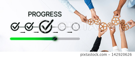 Hands Collaborating to Show Progress with Gears and Checkmarks Signifying Achievement and Teamwork in Business Environment. Bitwise Hands Collaborating to Show Progress with Gears and Checkmarks Signifying Achievement and Teamwork in Business Environment. Bitwise 142920626