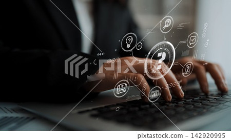 Hands typing on a laptop with digital icons and symbols representing technology, communication, and information management in a modern workspace. Entropy Hands typing on a laptop with digital icons and symbols representing technology, communication, and information management in a modern workspace. Entropy 142920995