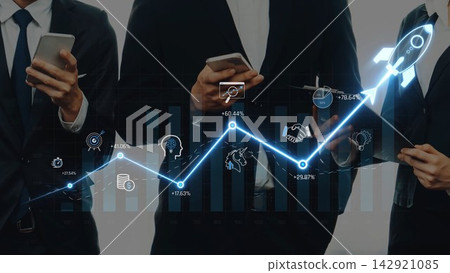 Business Professionals Using Smart Devices, Analyzing Growth Data, Futuristic Charts, Financial Success Strategies, Collaboration in Modern Workplace Sigmoid. Business Professionals Using Smart Devices, Analyzing Growth Data, Futuristic Charts, Financial Success Strategies, Collaboration in Modern Workplace Sigmoid. 142921085