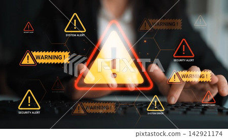Hands Typing on Keyboard with Security Alerts and Warning Notifications Displayed on Screen for Cybersecurity Concept and Digital Safety Awareness Gluon Hands Typing on Keyboard with Security Alerts and Warning Notifications Displayed on Screen for Cybersecurity Concept and Digital Safety Awareness Gluon 142921174