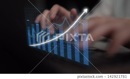 Hands Typing on Laptop with Graph Showing Growth, Business Analytics in Modern Office Environment, Data Visualization Concepts for Financial Success Copula Hands Typing on Laptop with Graph Showing Growth, Business Analytics in Modern Office Environment, Data Visualization Concepts for Financial Success Copula 142921781
