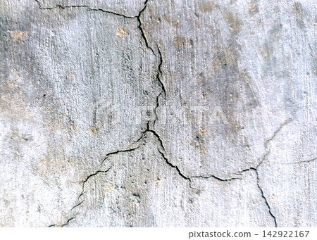 Weathered Concrete Wall with Cracks Texture Background 142922167