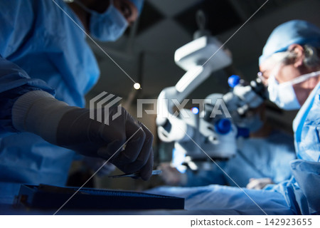 Eye surgeons performing delicate operation in a modern Middle Eastern eye hospital clinic in Egypt Eye surgeons performing delicate operation in a modern Middle Eastern eye hospital clinic in Egypt 142923655