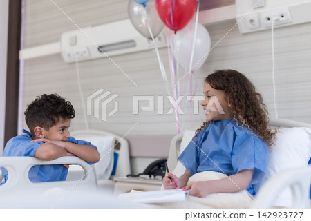 Children in hospital recovery room with balloons at a modern eye clinic in Egypt 142923727