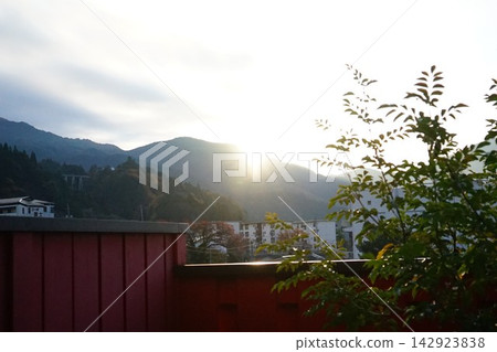 Large containers illuminated by the setting sun Large containers illuminated by the setting sun 142923838