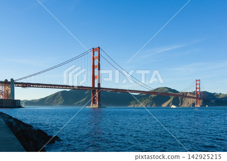 A full frontal view of the Golden Gate Bridge, seen from San Francisco Bay. 142925215