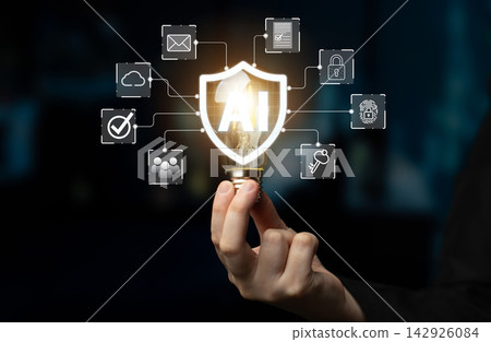 Hand Holding Light Bulb with AI Shield Symbol Surrounded by Various Technology Icons Representing Security, Innovation, and Digital Solutions. Entropy Hand Holding Light Bulb with AI Shield Symbol Surrounded by Various Technology Icons Representing Security, Innovation, and Digital Solutions. Entropy 142926084
