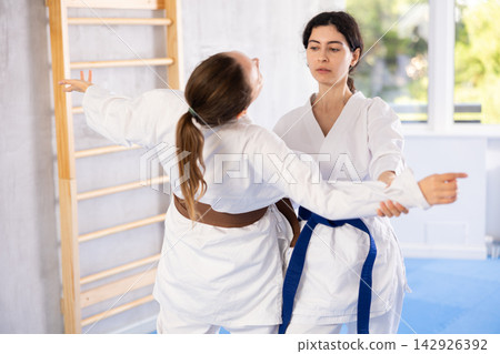 Karate practitioners showcase their techniques Karate practitioners showcase their techniques 142926392