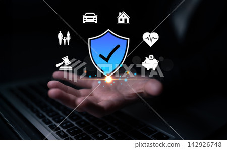 Hand Reaching for Security Shield Icon with Various Protection Symbols Representing Insurance and Safety Concept in Digital Environment Quark Hand Reaching for Security Shield Icon with Various Protection Symbols Representing Insurance and Safety Concept in Digital Environment Quark 142926748