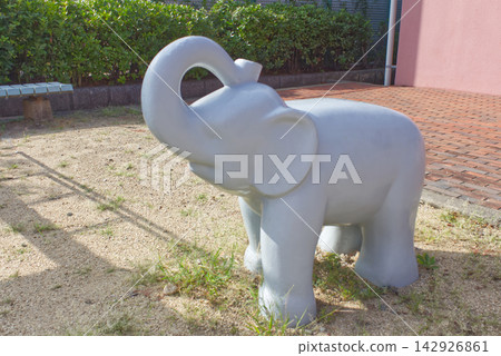 A retro concrete elephant playground structure in a housing complex park in Taisho Ward, Osaka City: A record of Showa-era scenery and the city. A retro concrete elephant playground structure in a housing complex park in Taisho Ward, Osaka City: A record of Showa-era scenery and the city. 142926861