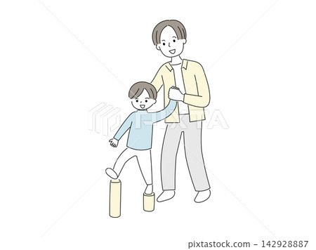 一個男孩和他的父親在公園裡一起玩耍 一個男孩和他的父親在公園裡一起玩耍 142928887