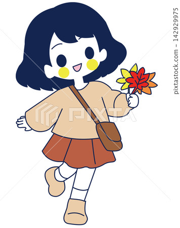 一位女孩正在欣賞秋葉。 一位女孩正在欣賞秋葉。 142929975