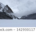 The mountains of Kitadaisetsu, shrouded in clouds during winter. 142930117