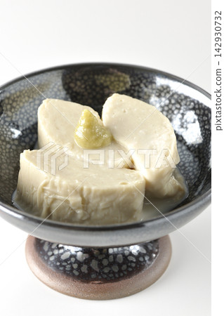 Fresh yuba (tofu skin) photographed against a white background. Fresh yuba (tofu skin) photographed against a white background. 142930732