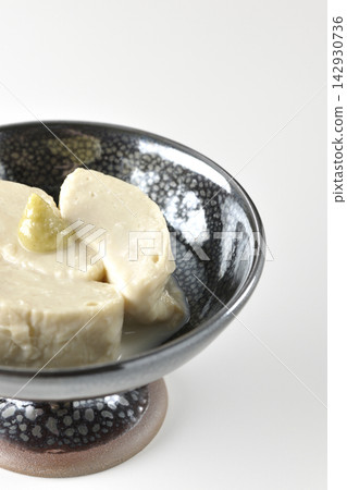 Fresh yuba (tofu skin) photographed against a white background. Fresh yuba (tofu skin) photographed against a white background. 142930736