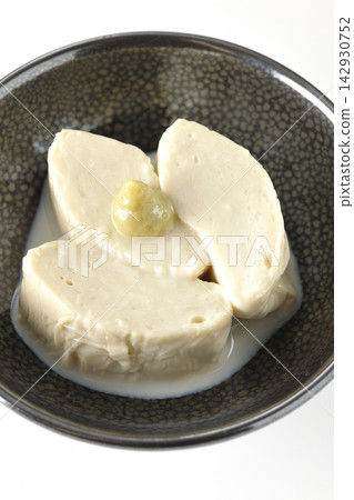 Fresh yuba (tofu skin) photographed against a white background. Fresh yuba (tofu skin) photographed against a white background. 142930752
