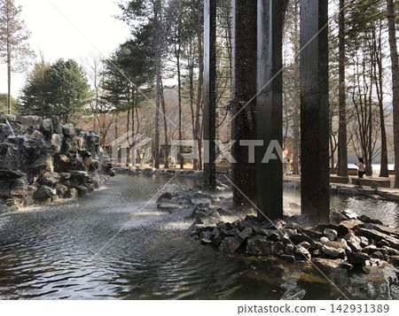 Modern Water Fountain Installation with Tall Pillars and Waterfall on Nami Island, Korea Modern Water Fountain Installation with Tall Pillars and Waterfall on Nami Island, Korea 142931389