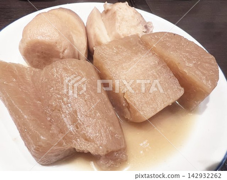 Delicious-looking oden with daikon radish and taro root soaked in broth. Delicious-looking oden with daikon radish and taro root soaked in broth. 142932262