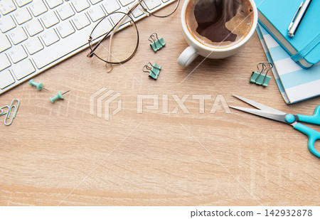 Overhead view of a modern desk with business essentials Overhead view of a modern desk with business essentials 142932878