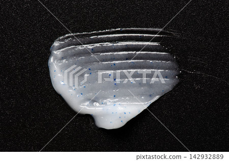Detox body scrub on a black background. Cosmetic product. Detox body scrub on a black background. Cosmetic product. 142932889