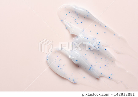 Detox skin scrub on a pink background. Cosmetic product for the body. Copy space Detox skin scrub on a pink background. Cosmetic product for the body. Copy space 142932891