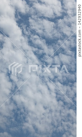 Natural White Cloudscape Against a Vibrant Blue Sky Natural White Cloudscape Against a Vibrant Blue Sky 142932940