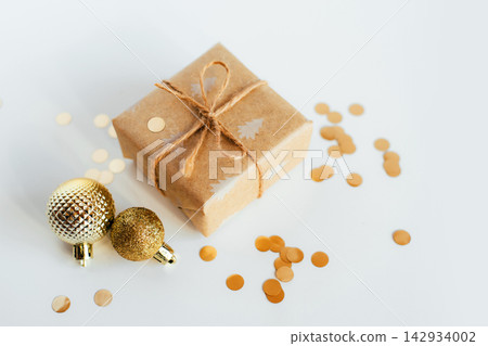 Christmas gift box on white background Christmas gift box on white background 142934002
