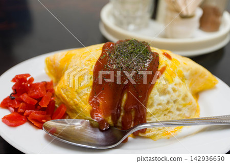 It looks tasty omelet rice It looks tasty omelet rice 142936650