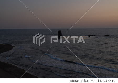 Heishi Rock standing in the sea off Esashi at dusk. Heishi Rock standing in the sea off Esashi at dusk. 142937240