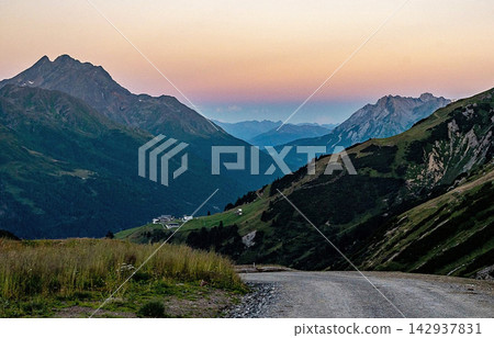 mountain road at sunset mountain road at sunset 142937831